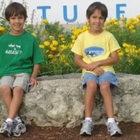 SeaWorld enthusiasts and twin brothers who attended summer camp as kids work at park for milestone anniversary