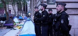 As Olympics near, Paris police clear 100 migrants from camp near City Hall