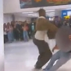 Shocking moment Las Vegas substitute teacher, 27, brawls with student 'who called him the n-word' in hallway filled with teenage onlookers