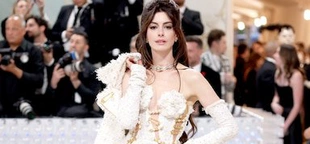Anne Hathaway pairs Gap shirt dress with Bulgari jewels