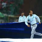 IPL leader Kolkata qualifies for playoffs after rain-affected win over Mumbai
