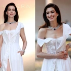 Anne Hathaway shocks fans in a white shirt dress from Gap: ‘The people’s princess’