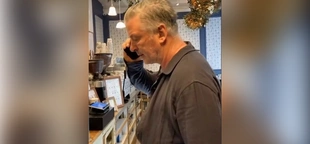 Alec Baldwin smacks phone of anti-Israel agitator who begged him to say 'Free Palestine' inside coffee shop