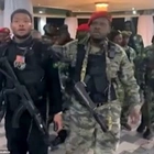 American-Congolese man is killed and his influencer son left begging for life alongside Maryland cannabis entrepreneur friend after leading bungled coup in the DRC - as new footage shows the moment they were captured