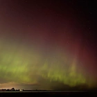 Solar storm produces dazzling light show, some power grid issues