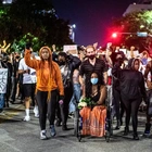 The mother of a protester whose killer was pardoned says she was robbed of justice