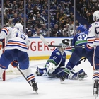 Bouchard scores in OT to lift Oilers to 4-3 win over Canucks in Game 2 to even playoff series