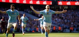 Manchester City wins historic fourth straight Premier League title, edging Arsenal with a final day victory over West Ham