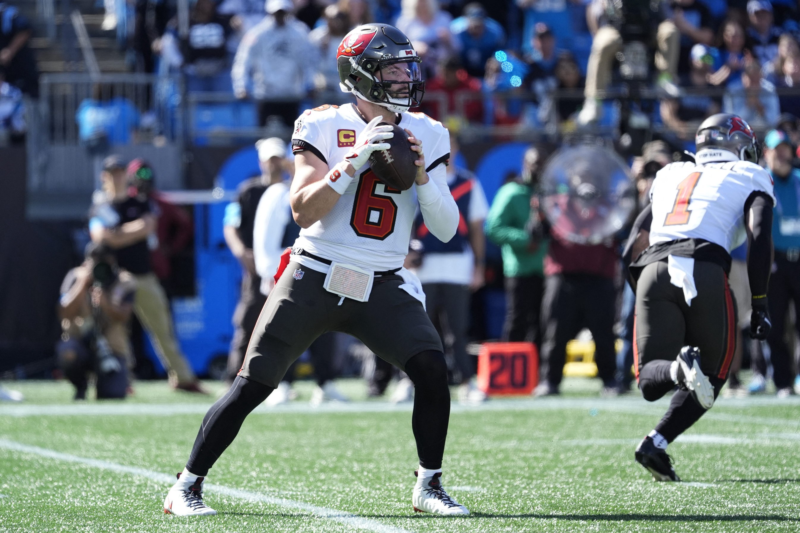 Tampa Bay Buccaneers quarterback Baker Mayfield (6) looks to pass against the Carolina Panthers during the first half at Bank of America Stadium.