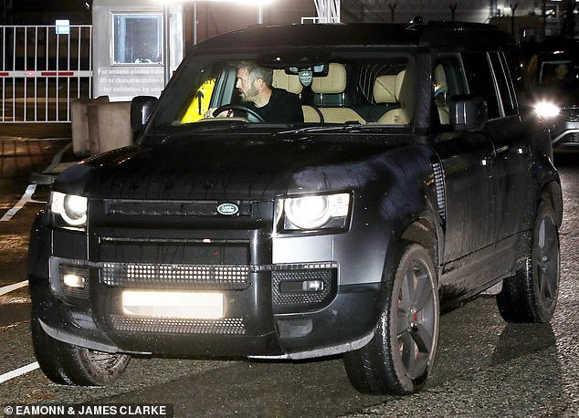 Under-fire Michael Carrick was pictured driving home from Manchester Airport in the early hours of Thursday following their humiliating 4-1 Champions League defeat at Como