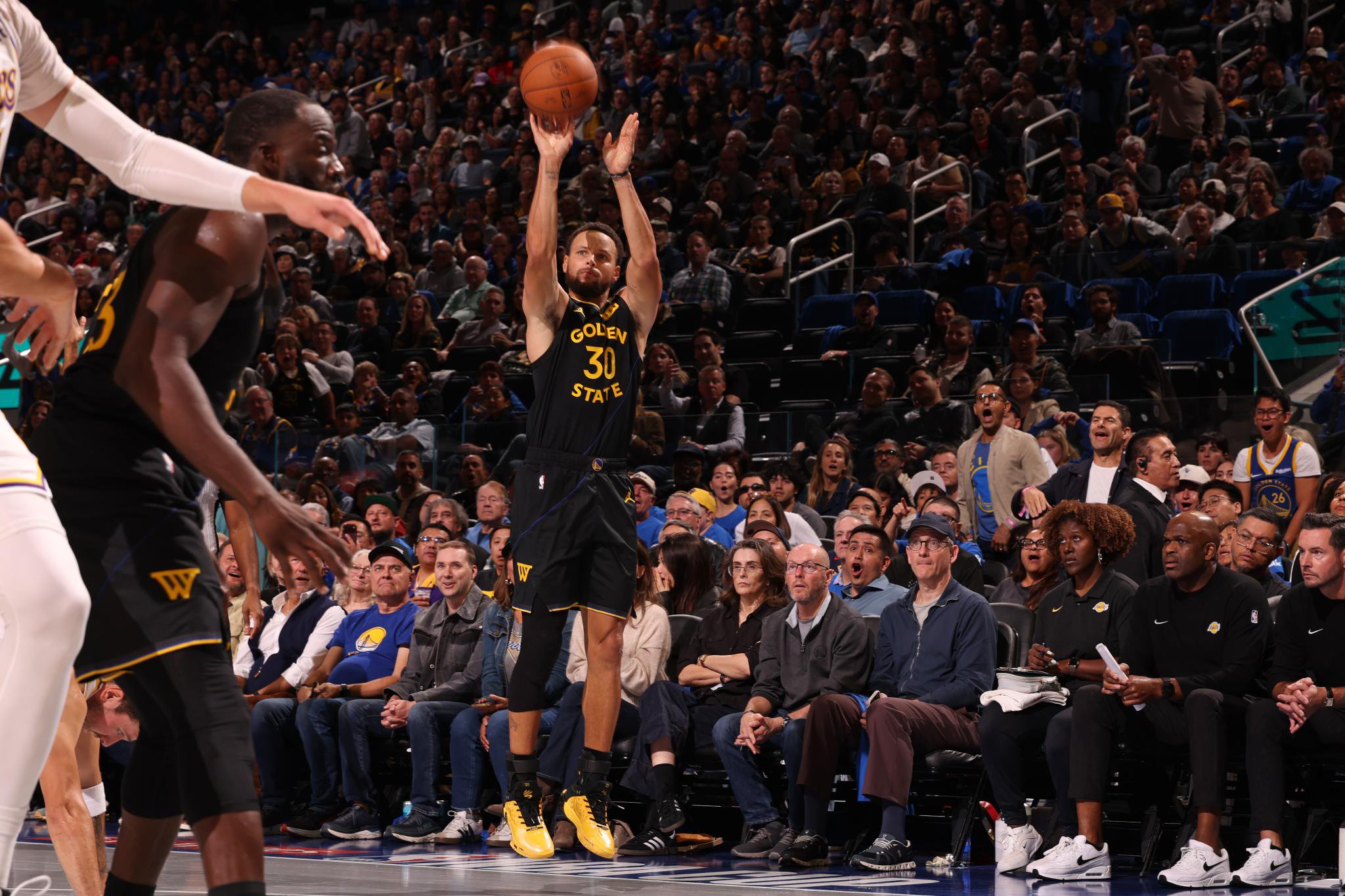 Stephen Curry of the Golden State Warriors shoots a 3-pointer against the Los Angeles Lakers.