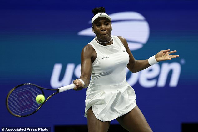 FILE - Venus Williams, of the United States, hits a return as she plays a women's doubles match with partner Serena Williams against Hao-Ching Chan, of Taiwan, and Maya Joint, at the U.S. Open tennis championships, Friday, Sept. 4, 2026, in New York. (AP Photo/Adam Hunger, File)