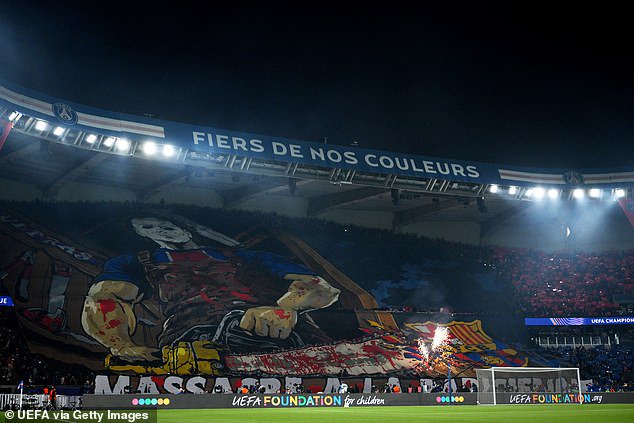 The banner carried the slogan ¿Massacre, Parisien style¿ and depicted a blood-spattered masked man in a PSG shirt cutting through a Barcelona crest with a chainsaw