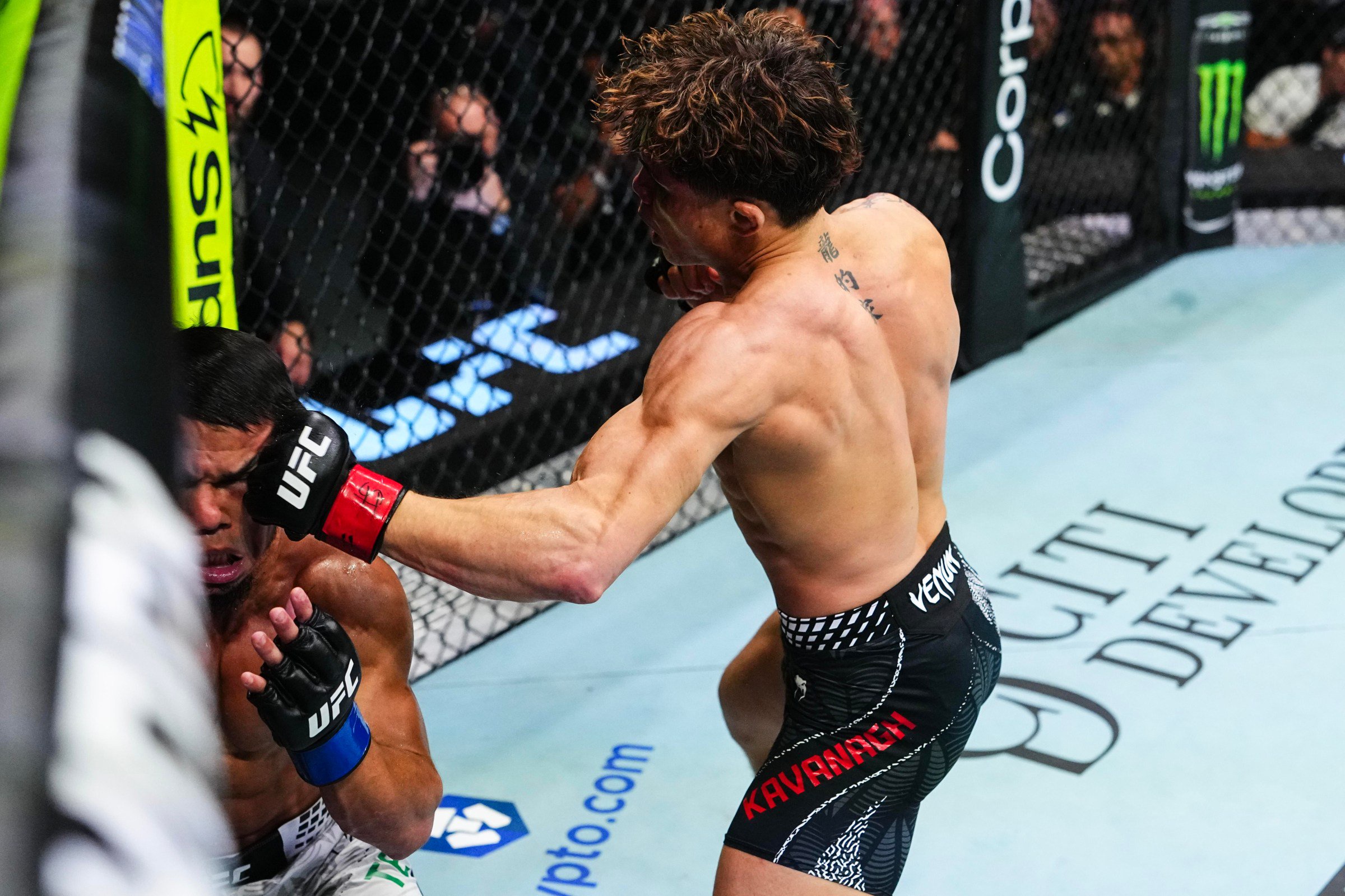 ABU DHABI, UNITED ARAB EMIRATES - OCTOBER 24: Lone’er Kavanagh of the United Kingdom punches Ramazan Temirov of Uzbekistan in a flyweight fight during the UFC 333 event at Etihad Arena on October 24, 2026 in Abu Dhabi, United Arab Emirates. (Photo by Jeff Bottari/Zuffa LLC)