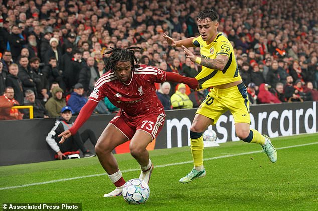 Liverpool's Rio Ngumoha, left, challenges for the ball with Villarreal's Alberto Moleiro during the Champions League opening phase soccer match between Liverpool and Villarreal in Liverpool, England, Tuesday, Oct. 20, 2026. (AP Photo/Ian Hodgson)