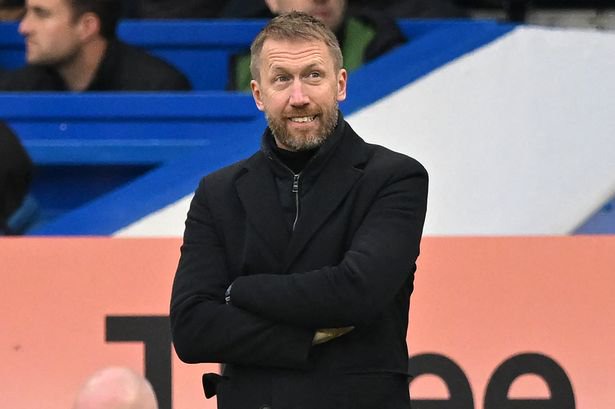 Graham Potter watches on during Chelsea's victory over Leeds United