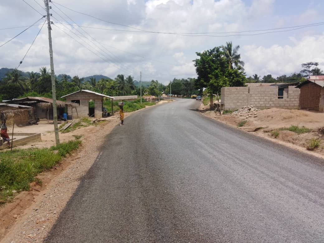May be an image of grass, tree and road