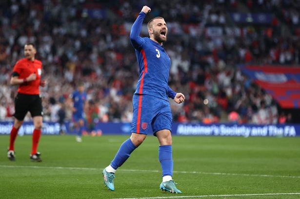 Luke Shaw celebrates bringing England level vs Switzerland.