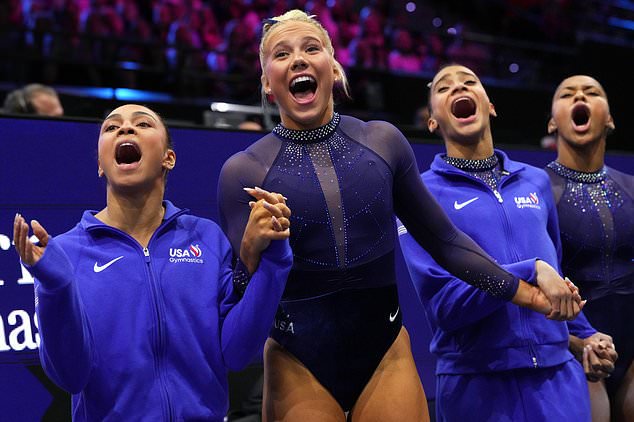 Hezly Rivera, from left, Reese Esponda, Charleigh Bullock and Skye Blakely, of the United States, watch teammate Claire Pease compete in the floor exercise during the women's team final at the Artistic Gymnastics World Championships in Rotterdam, the Netherlands, Wednesday, Oct. 21, 2026. (AP Photo/Francisco Seco)