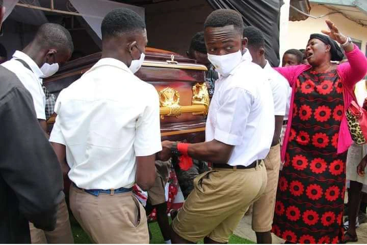 Tears Flow as students bury their teacher who was shot by armed robbers