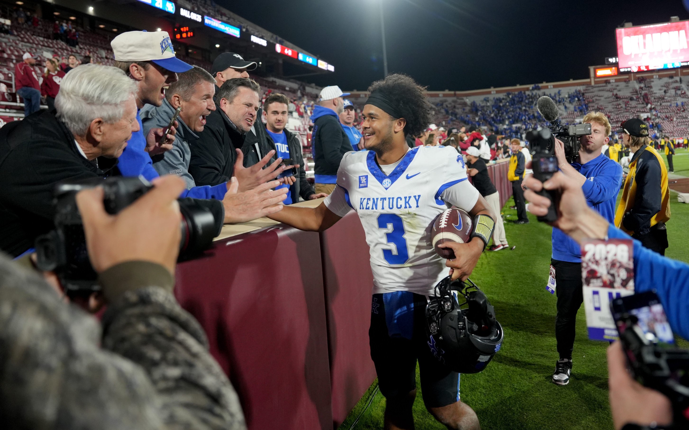 Kentucky's Kenny Minchey (3) celebrates with fans following the college football game between the University of Oklahoma Sooners (OU) and the Kentucky Wildcats at Gaylord Family — Oklahoma Memorial Stadium in Norman, Okla.,  Saturday, Oct., 17, 2026.