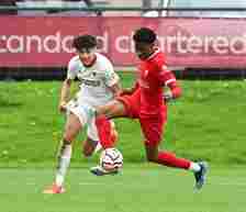 Ethan Wheatley of Manchester United U18 chases down Emmanuel Airoboma of Liverpool U18