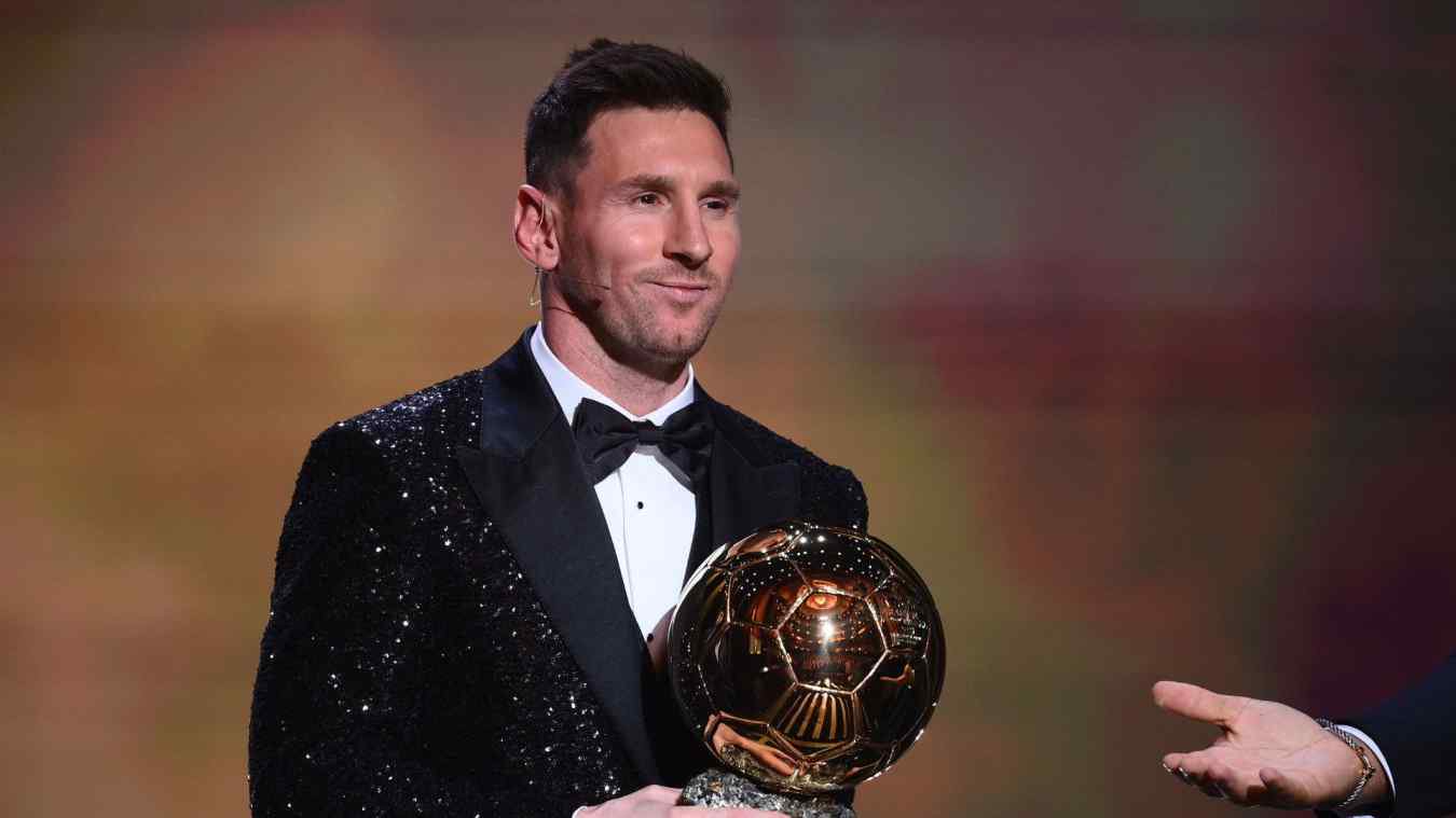 Paris Saint-Germain's Argentine forward Lionel Messi poses after being awarded the the Ballon d'Or award during the 2021 Ballon d'Or France Football award ceremony at the Theatre du Chatelet in Paris on November 29, 2021