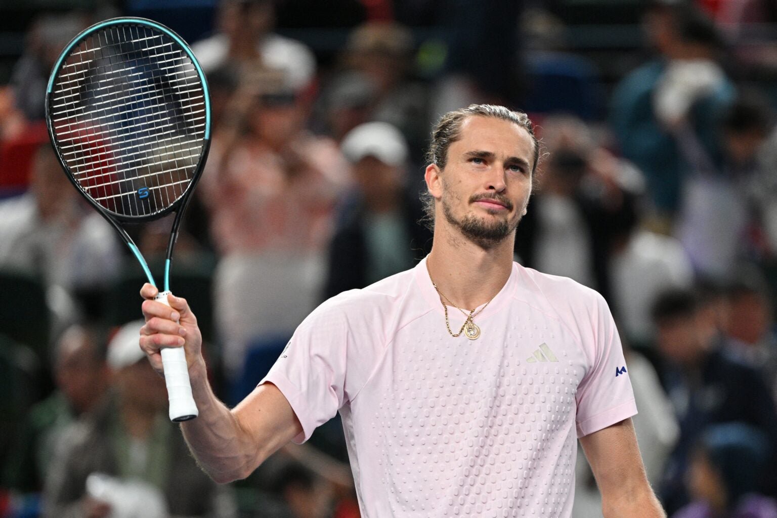 Alexander Zverev celebrates after beating Alex de Minaur in Shanghai.