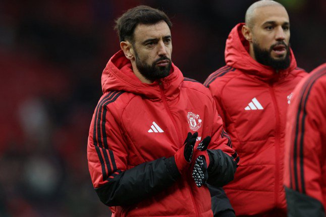 Manchester United's Portuguese midfielder #08 Bruno Fernandes applauds fans on the pitch after the English Premier League football match between Manchester United and Bournemouth at Old Trafford in Manchester, north west England, on October 25, 2026. Bournemouth won the game 3-0. (Photo by Darren Staples / AFP via Getty Images) / RESTRICTED TO EDITORIAL USE. No use with unauthorized audio, video, data, fixture lists, club/league logos or 'live' services. Online in-match use limited to 120 images. An additional 40 images may be used in extra time. No video emulation. Social media in-match use limited to 120 images. An additional 40 images may be used in extra time. No use in betting publications, games or single club/league/player publications. /