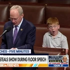 Congressman's House floor speech goes viral after son steals show with silly faces
