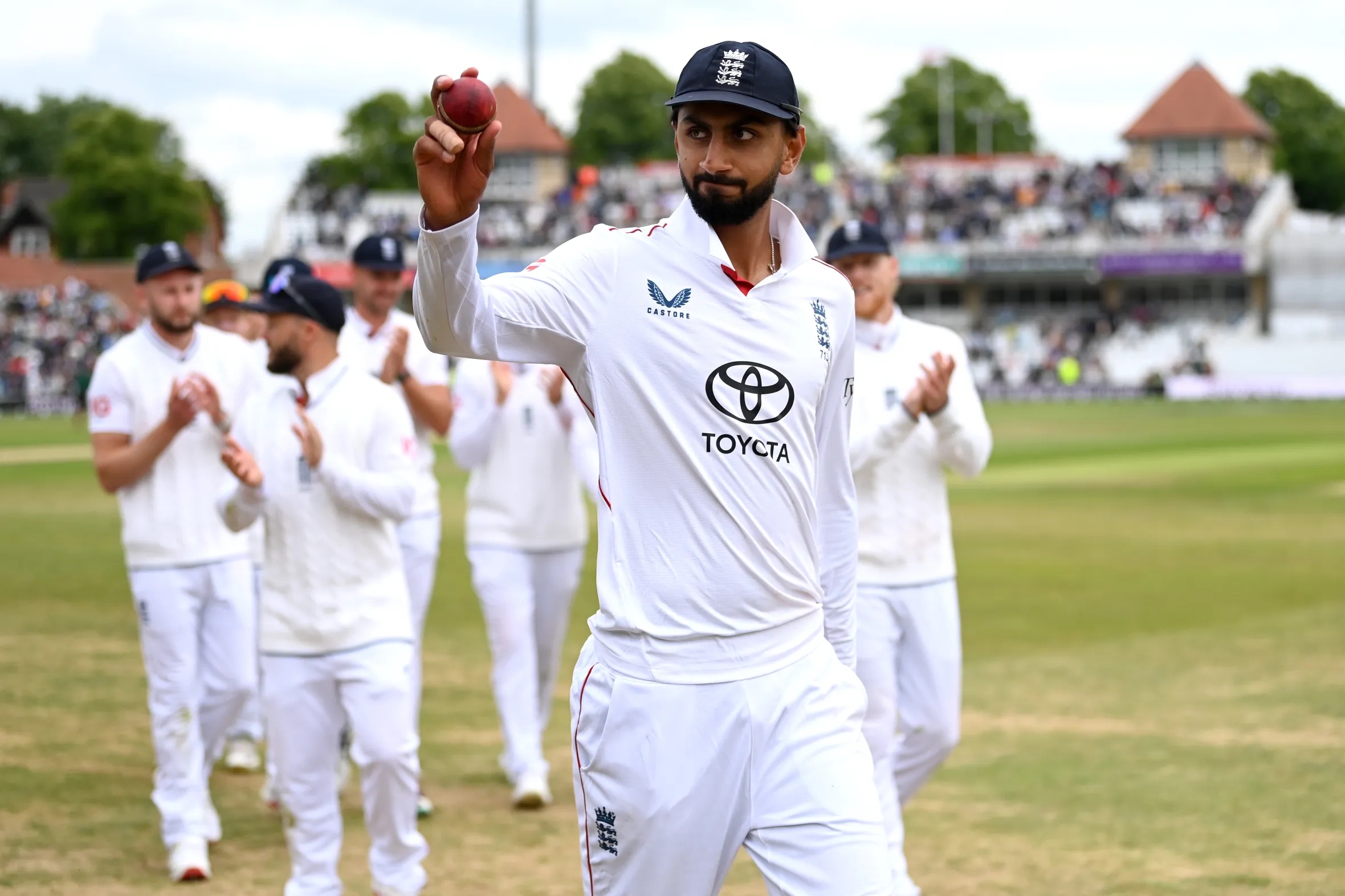 Shoaib Bashir of England salutes the crowd as he leaves the field after claiming six wickets to win the Rothesay Test Match.