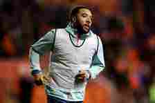 Troy Deeney of Forest Green Rovers warms up at half time during the Emirates FA Cup Second Round match between Blackpool and Forest Green Rovers at...