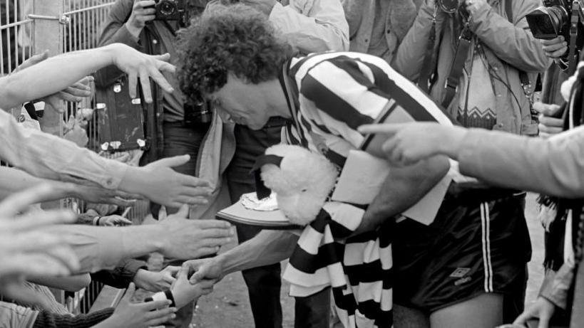 Kevin Keegan getting welcomed by Newcastle fans after arriving as a player from Southampton.