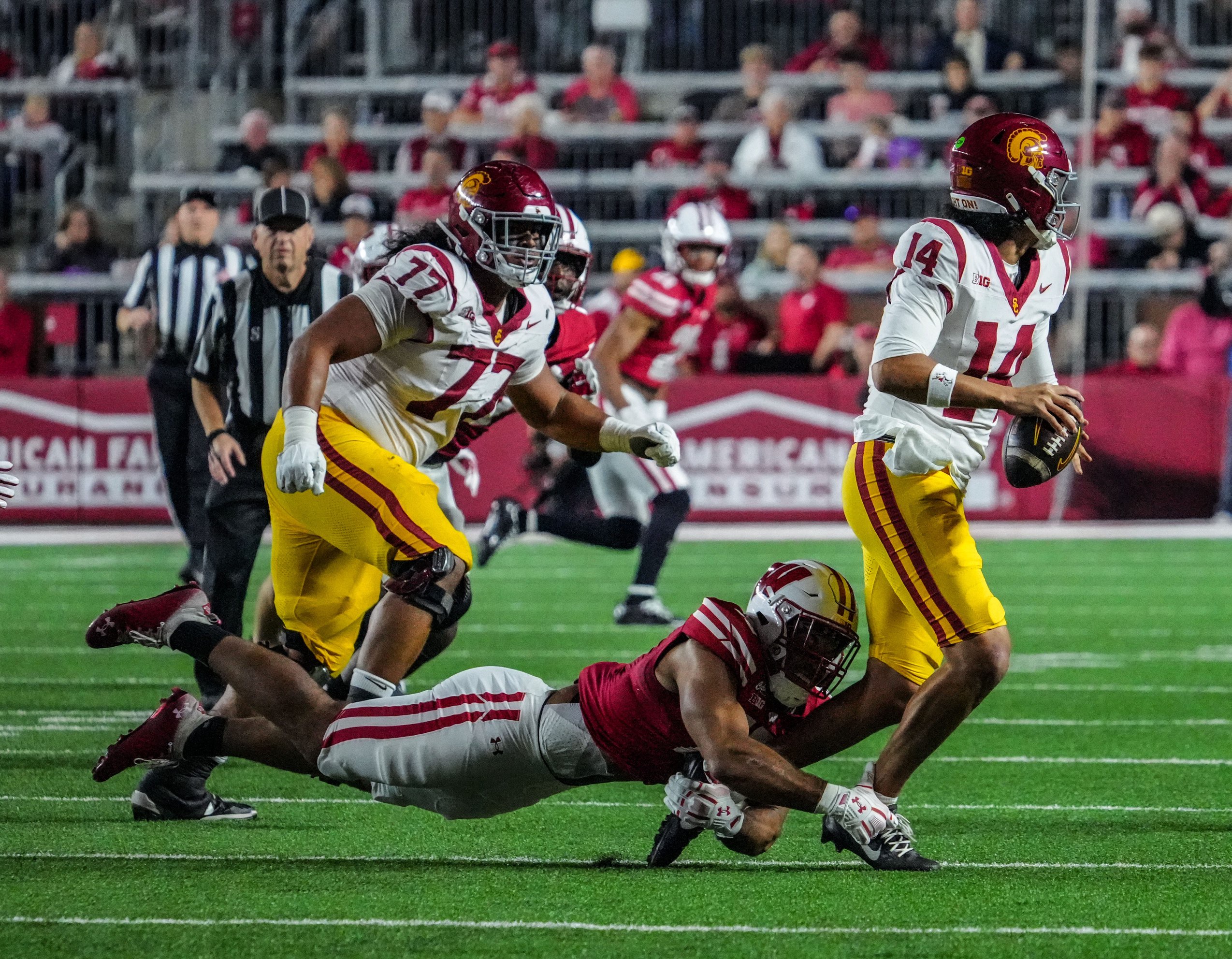 Wisconsin Badgers outside linebacker Sebastian Cheeks (15) sacks USC Trojans quarterback Jayden Maiava (14) during their game Oct. 24, 2026, at Camp Randall Stadium in Madison, Wisconsin.