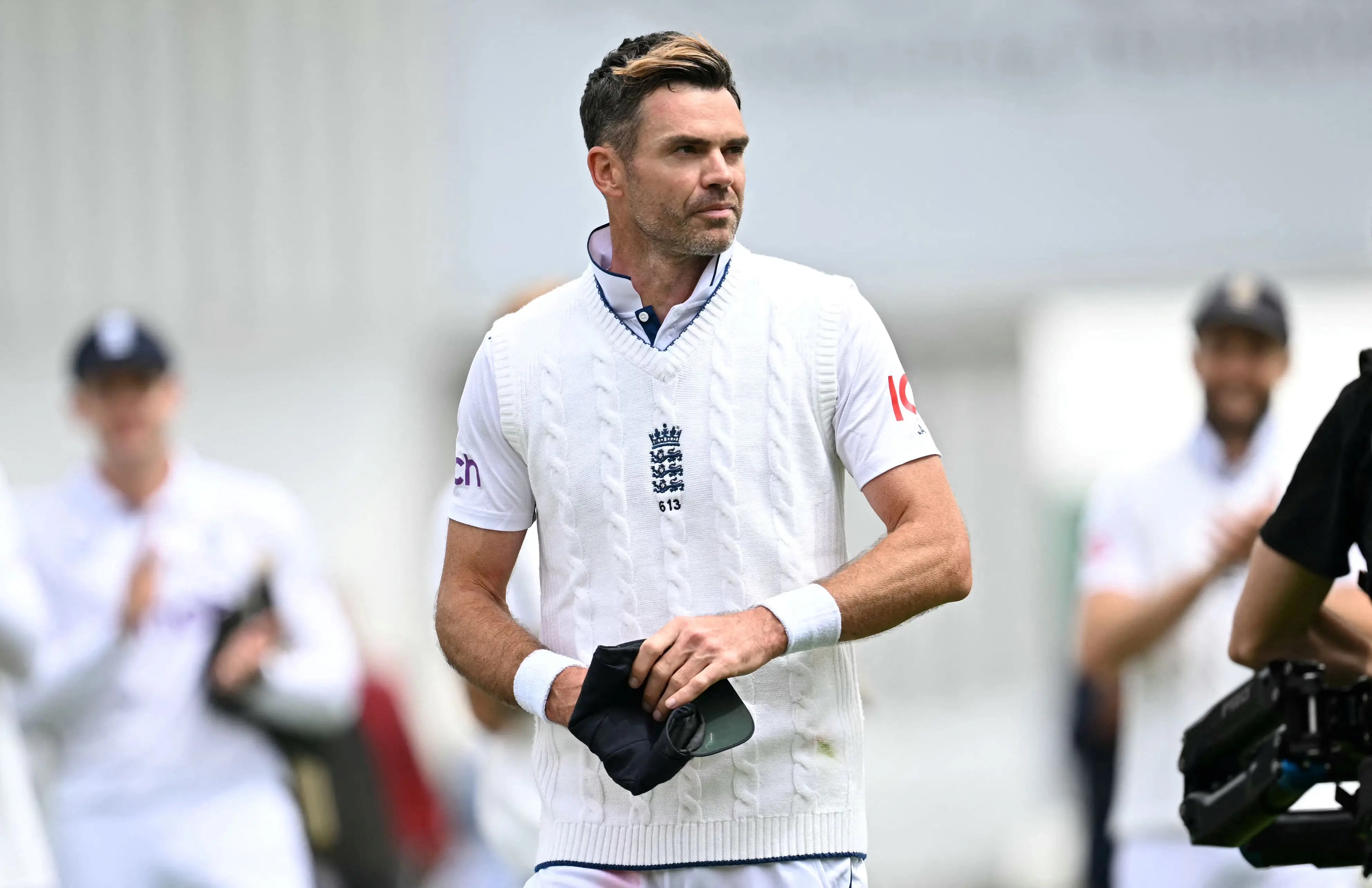 
England's James Anderson walks off the field in his final Test match after the conclusion of play on the third day of the first Test cricket match between England and West Indies at Lord's Cricket Ground in London on July 12, 2024, after England beat West Indies by an innings and 114 runs.