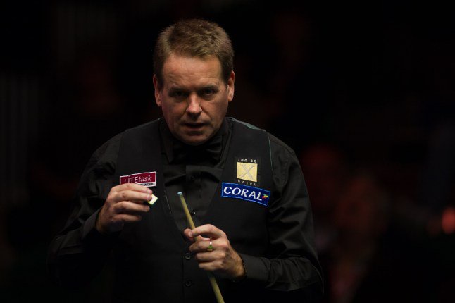 BELFAST, NORTHERN IRELAND - NOVEMBER 15: Joe Swail of Northern Ireland chalks the cue during the first round match against Dominic Dal of Wales on day two of Coral Northern Ireland Open 2016 at Titanic Exhibition Centre on November 15, 2016 in Belfast, Northern Ireland. (Photo by Visual China Group via Getty Images/Visual China Group via Getty Images)