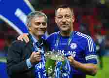 Manager Jose Mourinho of Chelsea and John Terry of Chelsea pose with the trophy during the Capital One Cup Final match between Chelsea and Tottenha...