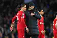 Jurgen Klopp the head coach of Liverpool consoles a dejected Darwin Nunez of Liverpool after his teams 2-0 loss during the Premier League match between Everton FC and Liverpool FC at Goodison Park