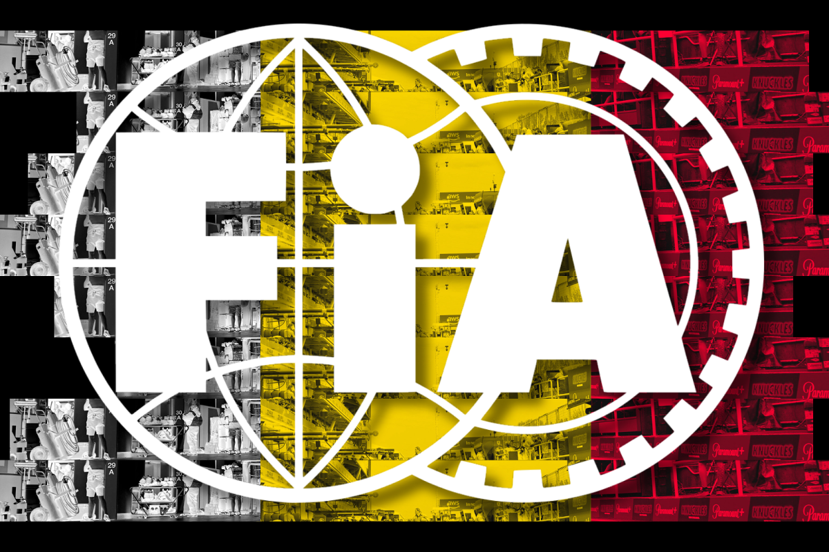 White FIA logo with black, yellow and red Belgian flag background — Photo: © IMAGO