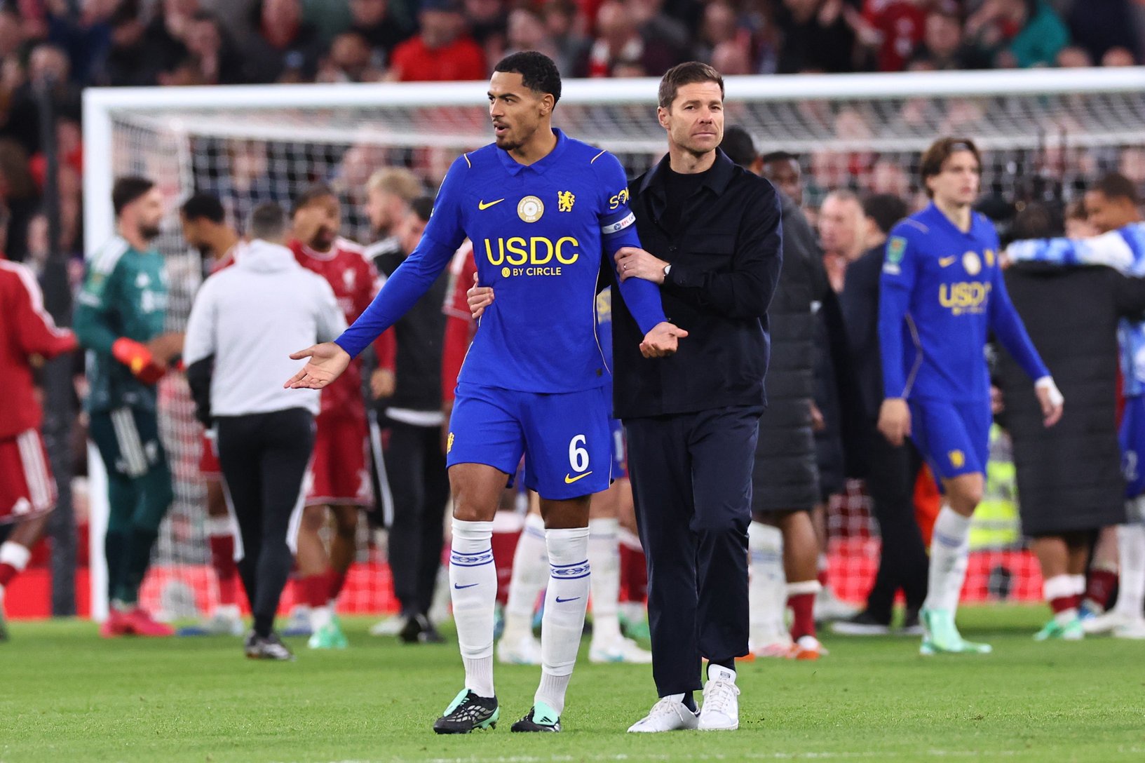 Levi Colwill and Xabi Alonso look on after Chelsea's loss to Liverpool