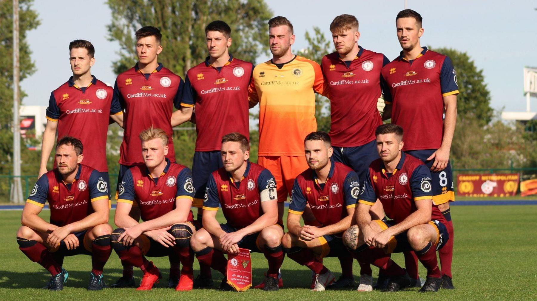 Cardiff Met first team in dark red, six standing behind five crouching for a pre-match photo