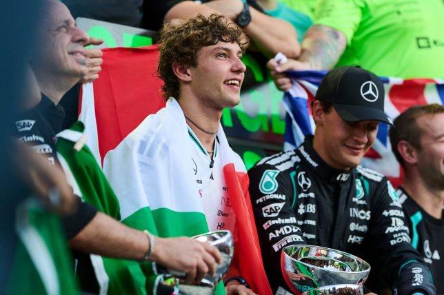 MONZA, ITALY - SEPTEMBER 06: Race winner Andrea Kimi Antonelli of Italy and Mercedes AMG Petronas F1 Team Second placed George Russell of Great Britain and Mercedes AMG Petronas F1 Team and the Mercedes AMG Petronas F1 Team celebrate during the F1 Grand Prix of Italy at Autodromo Nazionale Monza on September 06, 2026 in Monza, Italy. (Photo by Guido De Bortoli/Getty Images)