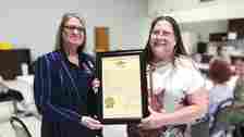 Rep. Cyndi Buchheit-Courtway, left, presented Adrian Brogan with a state proclamation on behalf of the Missouri House of Representatives.