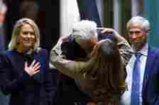 WikiLeaks founder Julian Assange kisses his wife Stella Assange as he arrives in Canberra, Australia, June 26