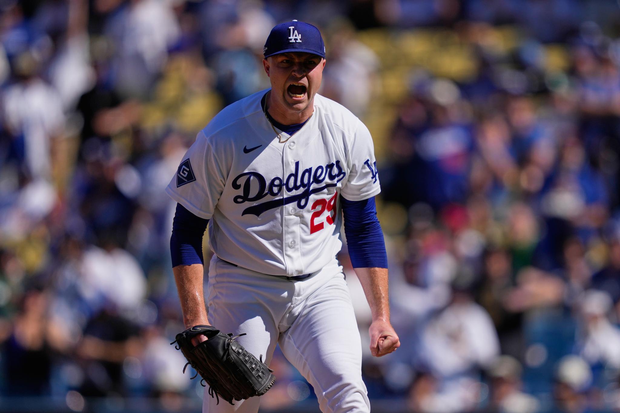 Los Angeles Dodgers starting pitcher Tarik Skubal celebrates after striking out an Atlanta Braves batter.
