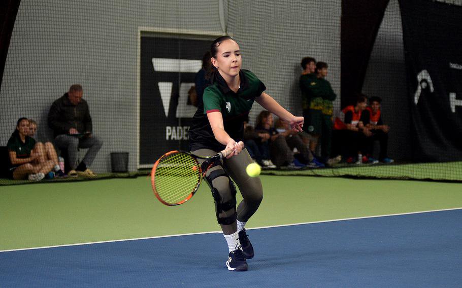 Sabina Kralikova reaches to hit the ball.