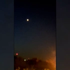 Video shows flashes in sky near location where Israel struck Iran