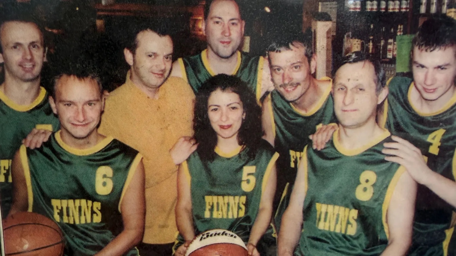 Supplied A vintage colour photo of basket ball players in green Finns tops