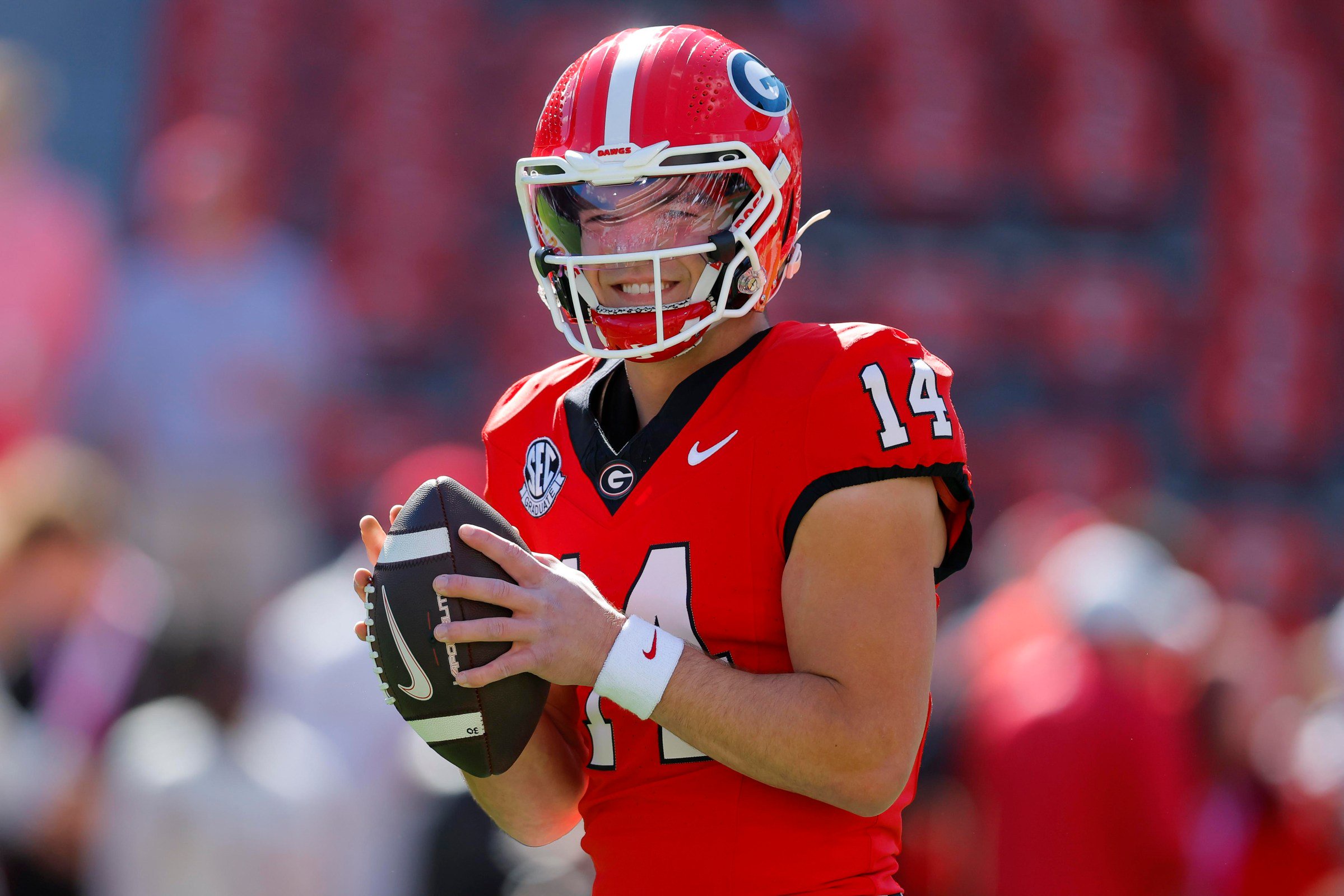 ATHENS, GEORGIA - OCTOBER 17: Gunner Stockton #14 of the Georgia Bulldogs warms up prior to the game against the Auburn Tigers at Sanford Stadium on October 17, 2026 in Athens, Georgia. (Photo by Todd Kirkland/Getty Images)