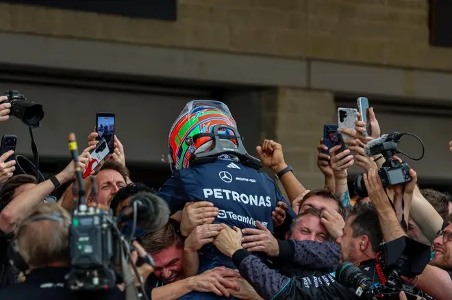 Antonelli of Mercedes AMG celebrating on the podium.